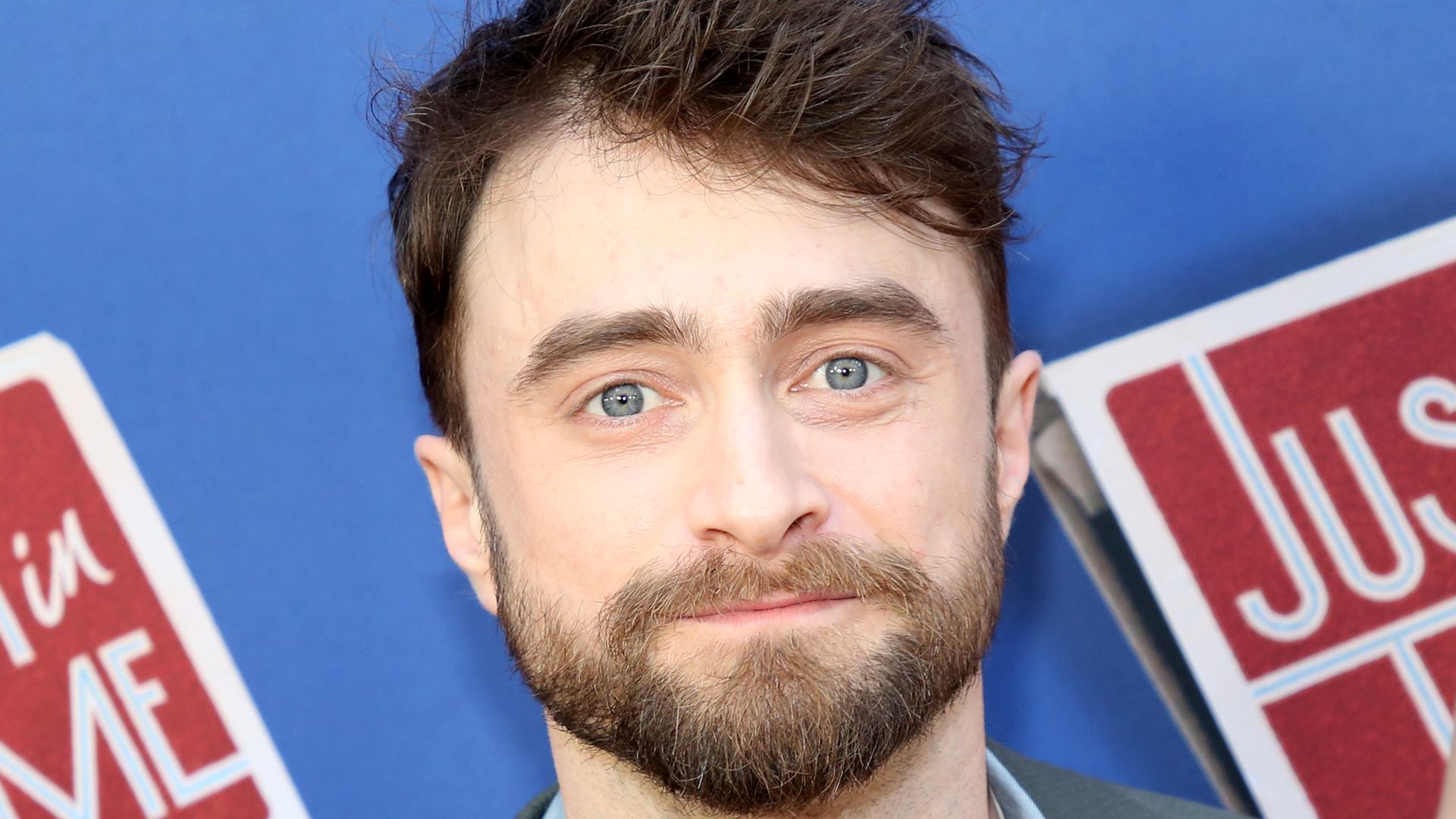 Daniel Radcliffe's statuesque girlfriend towers over him in rare appearance