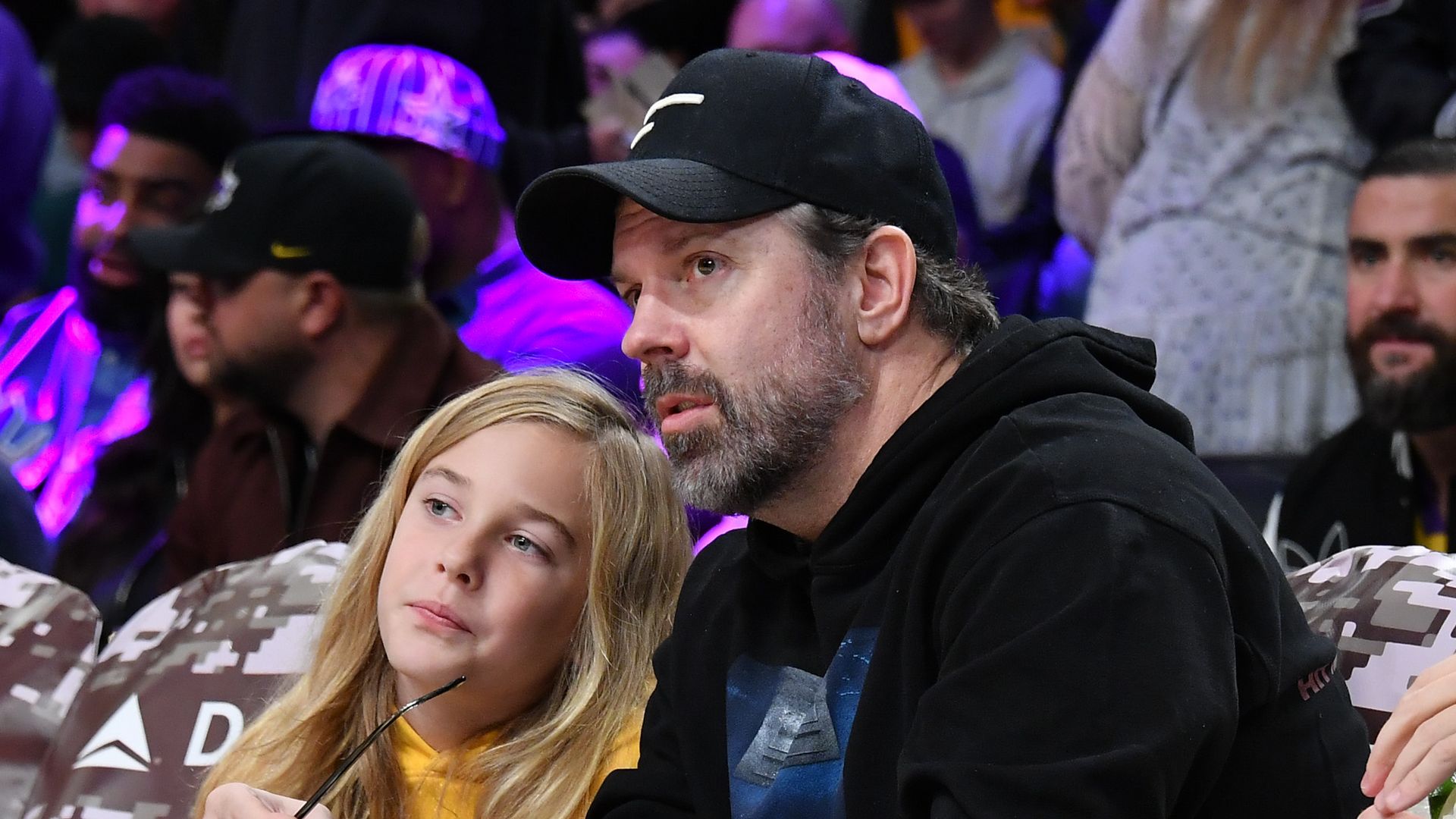 Jason Sudeikis' son's almost waist-length blonde hair is incredible