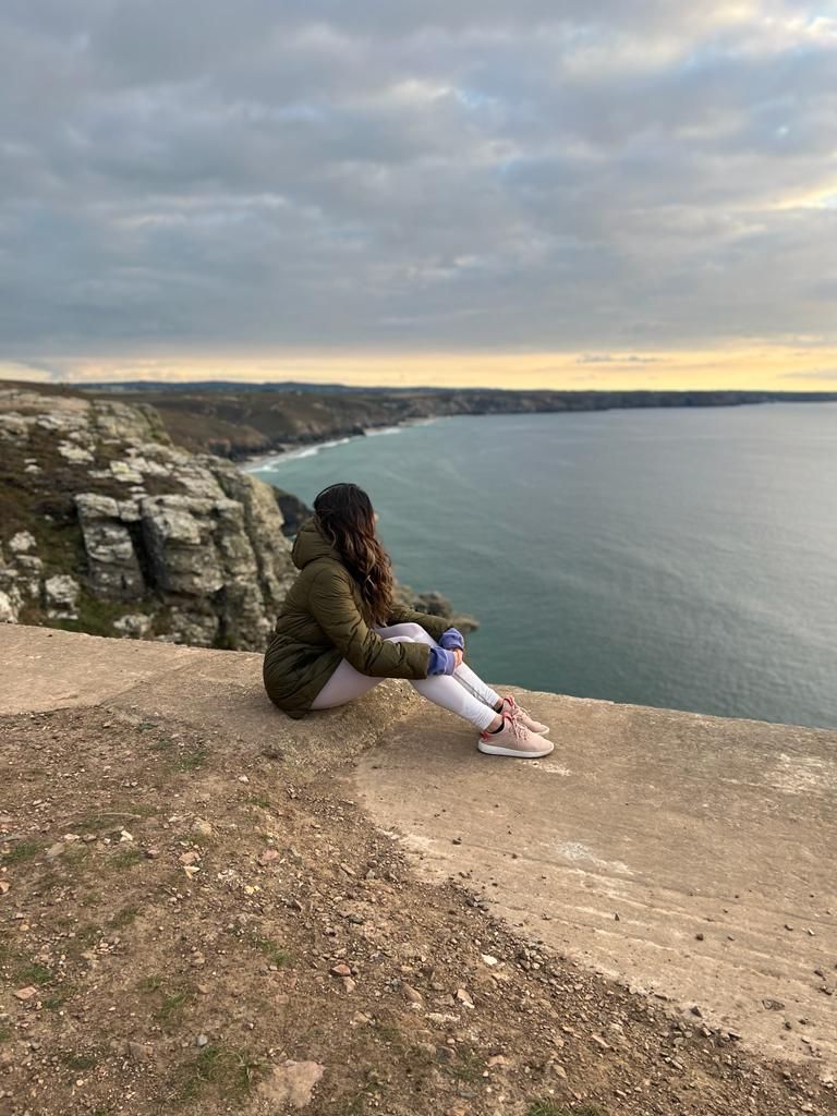 Woman looking out to sea