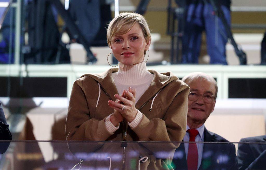Princess Charlene clapping
