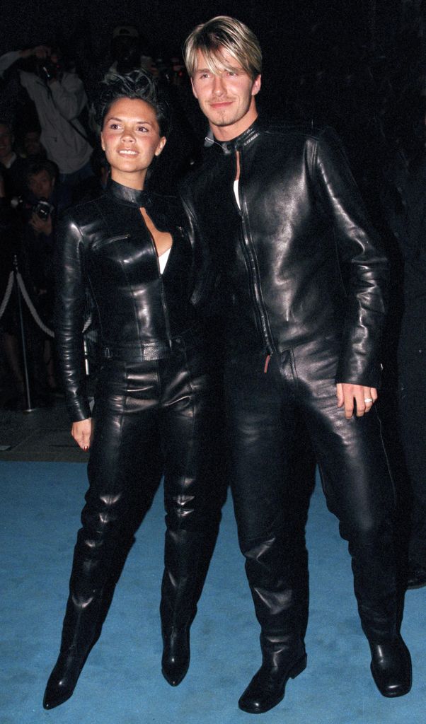 David and Victoria Beckham wear matching leather jackets and trousers in London