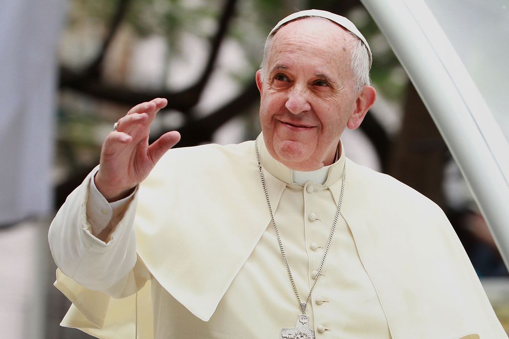 Pope Francis waves to thousands of followers as he arrives at the Manila Cathedral on January 16, 2015 in Manila, Philippines. Pope Francis will visit venues across Leyte and Manila during his visit to the Philippines from January 15 - 19. The visit is expected to attract crowds in the millions as Filipino Catholics flock to catch a glimpse of the leader of the Catholic Church in the Philippines for the first time since 1995. The Pope will begin the tour in Manila, then travelling to Tacloban to visit areas devastated by Typhoon Haiyan before returning to Manila to hold a mass at Rizal Park. The Philippines is the only Catholic majority nation in Asia with around 90 percent of the population professing the faith
