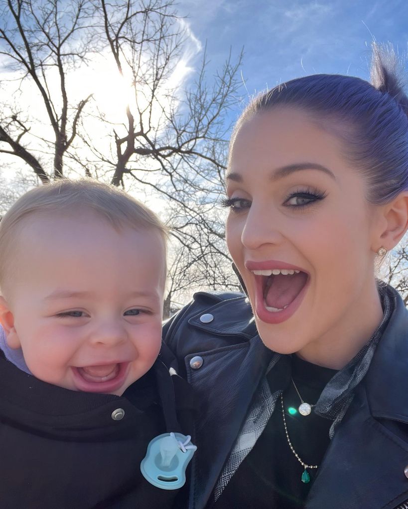 kelly osbourne smiling with son sidney