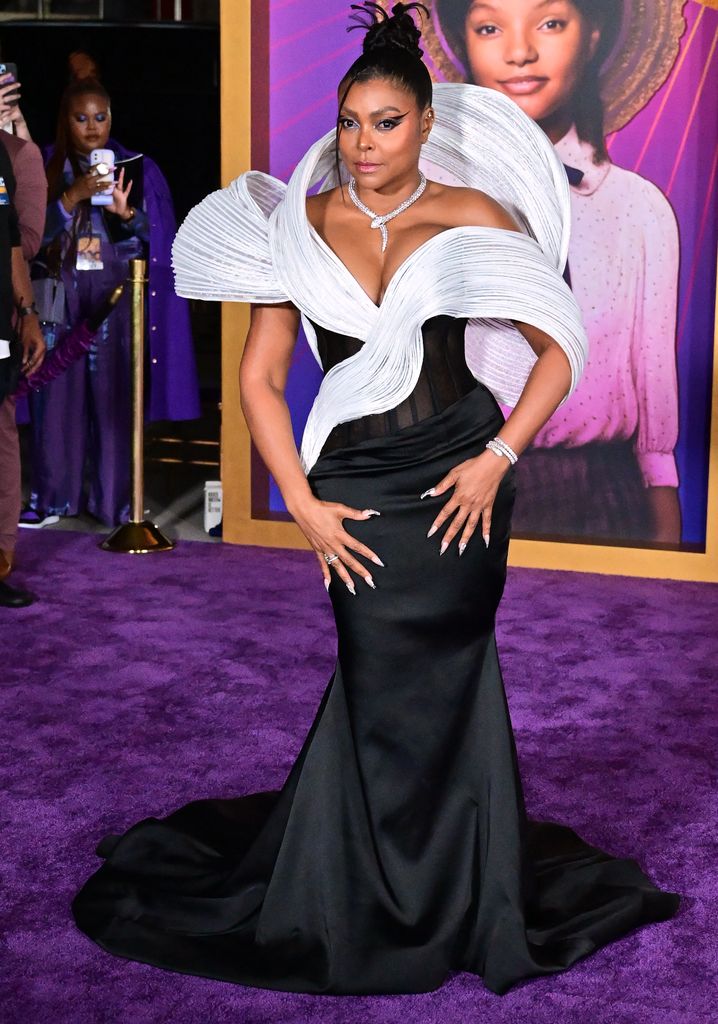 Taraji P. Henson in black dress with white ruffle around head