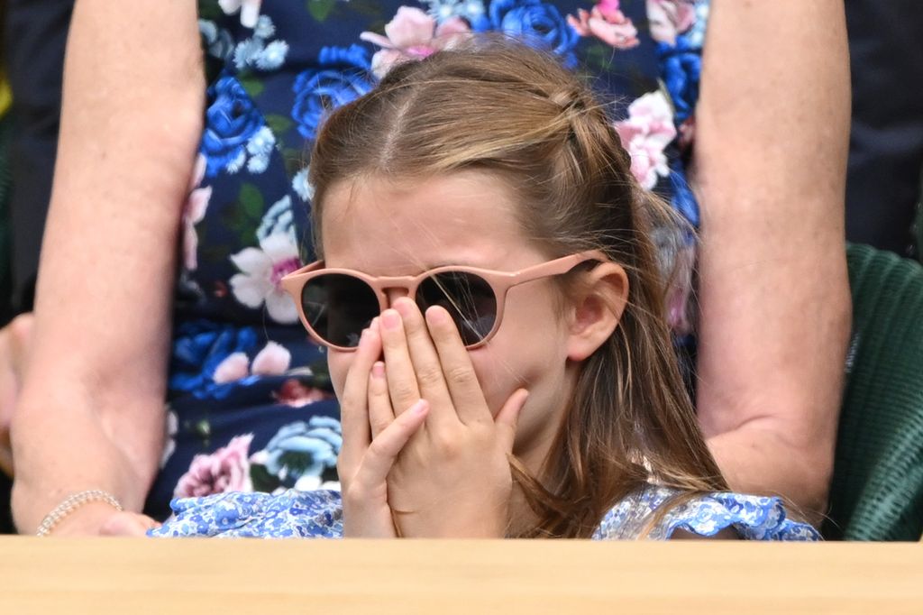 Princess Charlotte of Wales watches Carlos Alcaraz vs Novak Djokovic in the Wimbledon 2023 men's final on Centre Court during day fourteen of the Wimbledon Tennis Championships at the All England Lawn Tennis and Croquet Club on July 16, 2023