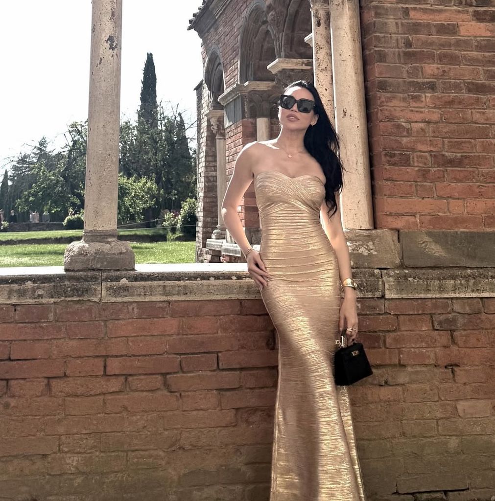 Dara Huang stunned in a gold gown for a friend's Tuscan wedding