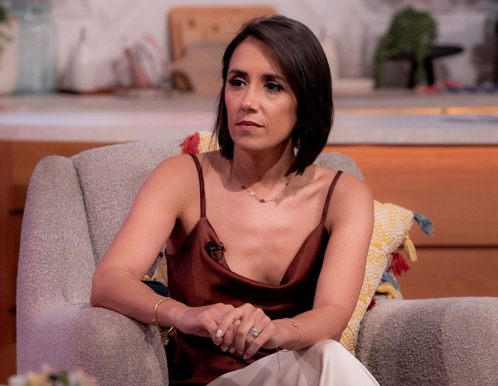 janette manrara on chair in brown top