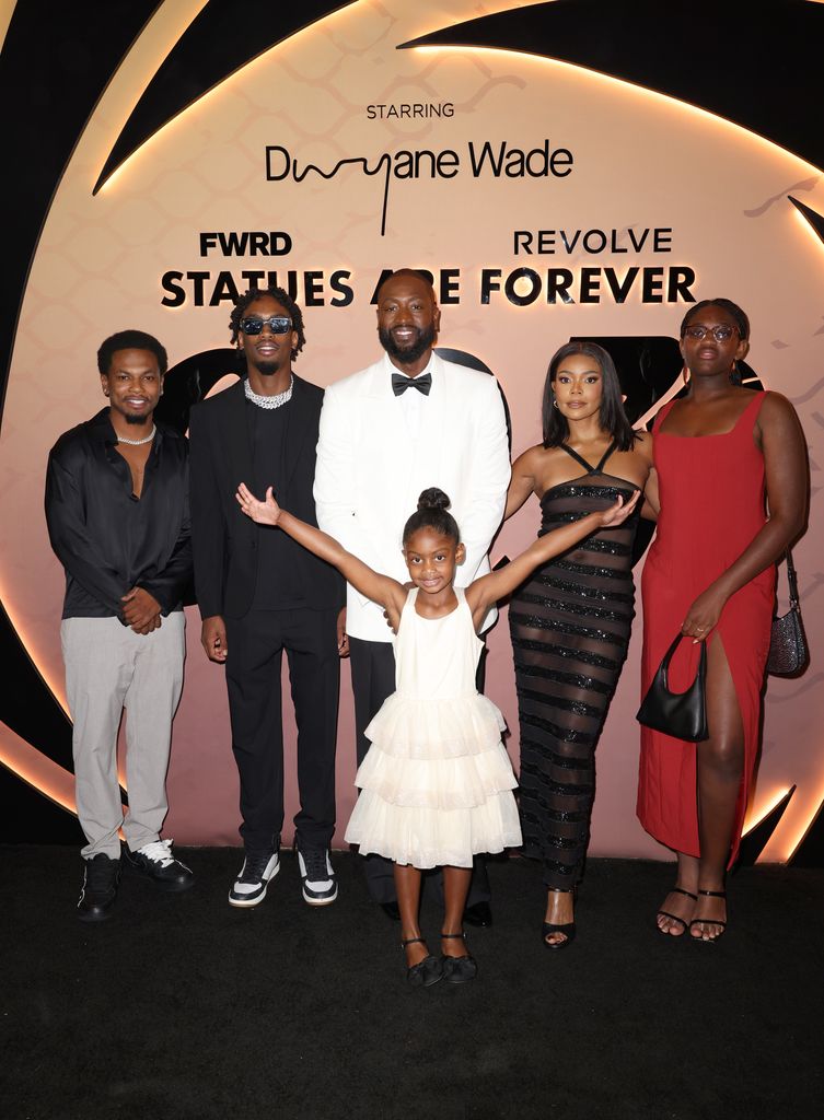 Dahveon Morris, Zaire Wade, Dwyane Wade, Kaavia Wade, Gabrielle Union and Zaya Wade attend Dwyane Wade's 003 Statues Are Forever Party With FWRD at Queen Miami Beach on October 25, 2024 in Miami Beach, Florida