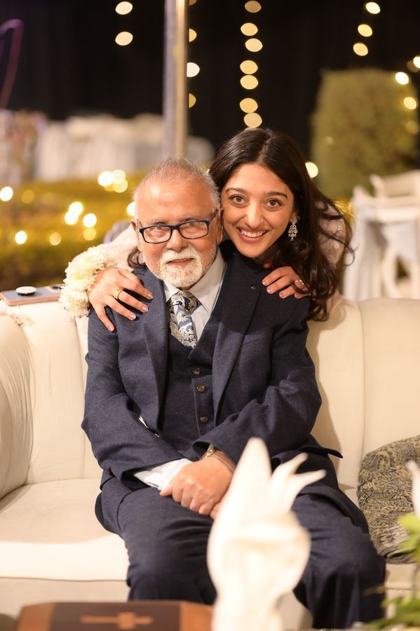 Woman with an older man smiling 