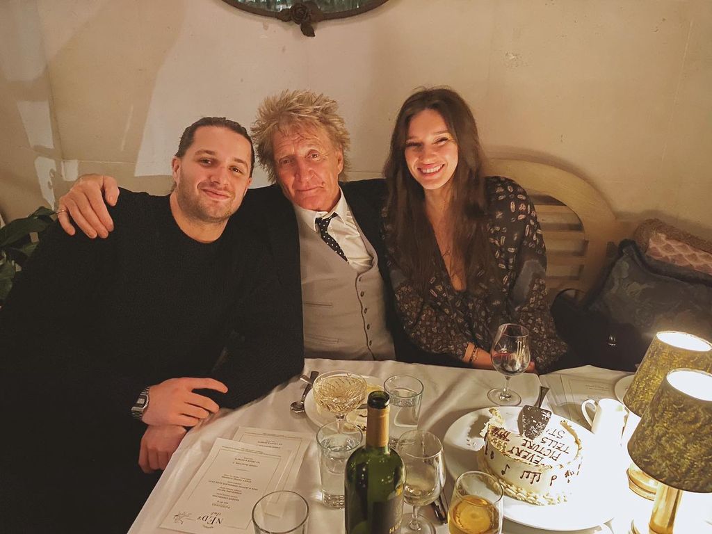 Liam and Renee at a restaurant with rod