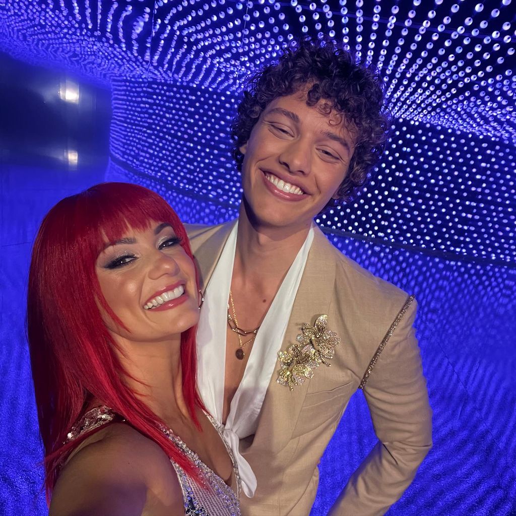 Bobby Brazier and Dianne Buswell in a room of blue lights
