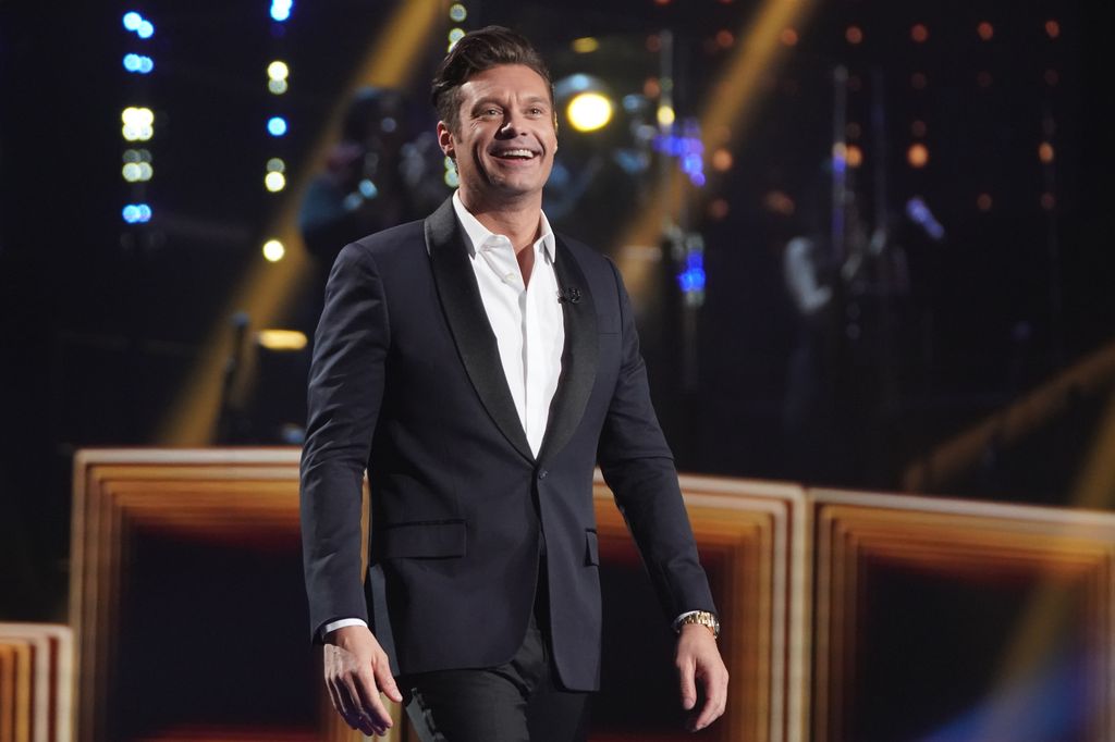 Ryan smiling on stage