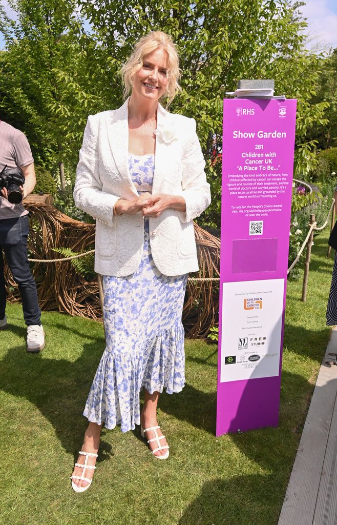 penny lancaster in blue floral dress