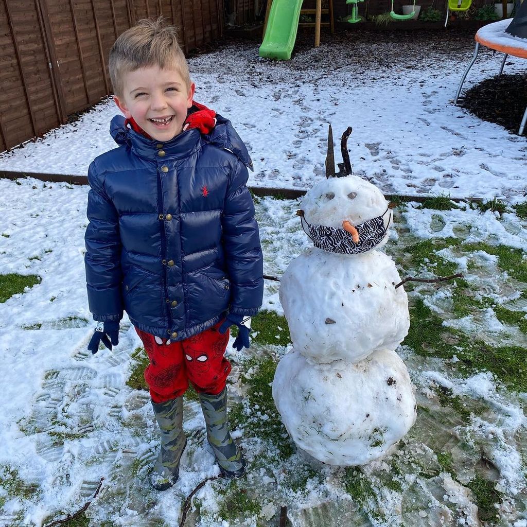 Izzi Warner shared this photo of her son Bobby in the garden on a snow day