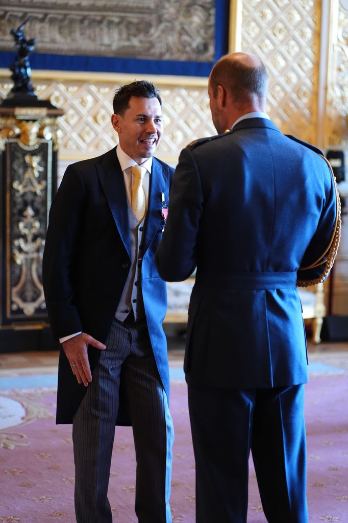 William awarded Jaco van Gass with his OBE