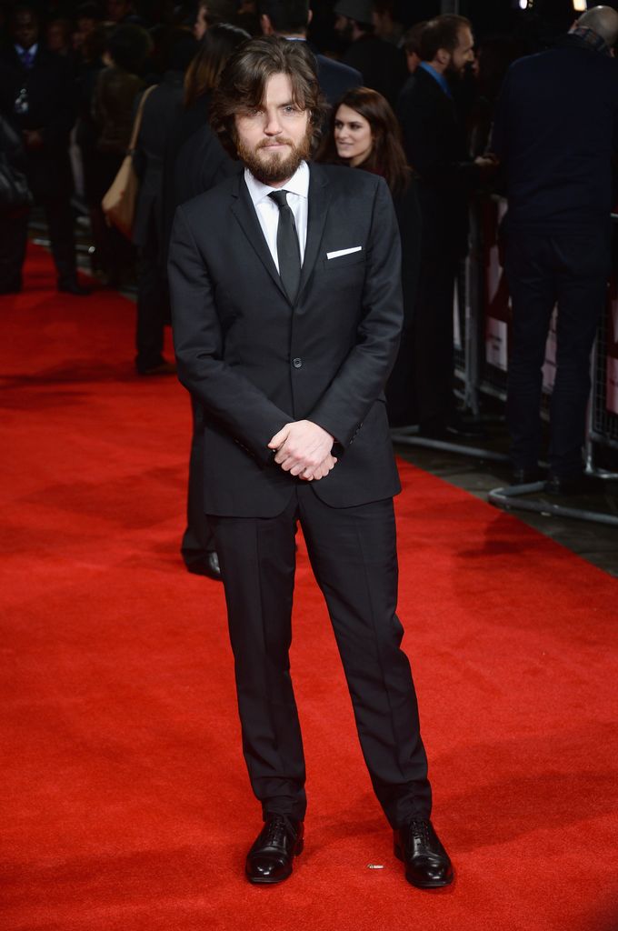 Tom Burke on the red carpet of "The Invisible Woman" UK Premiere at the Odeon Kensington on January 27, 2014 i