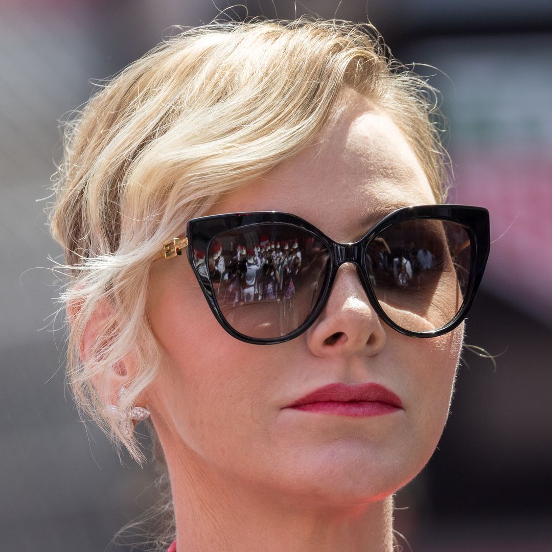 Princess Charlene causes a stir in head-to-toe scarlet and silk