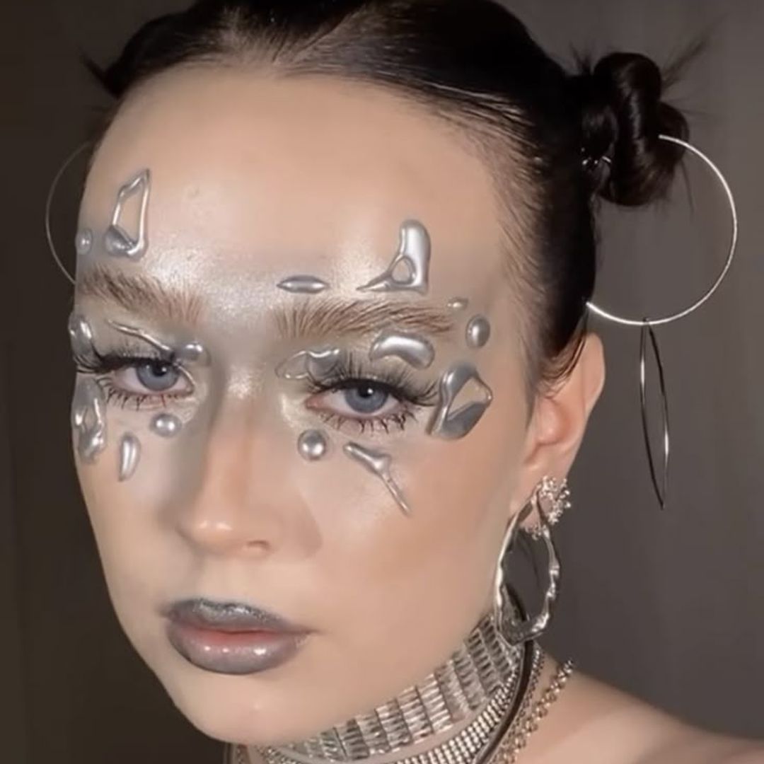 Silver y3k makeup with reflective finish 