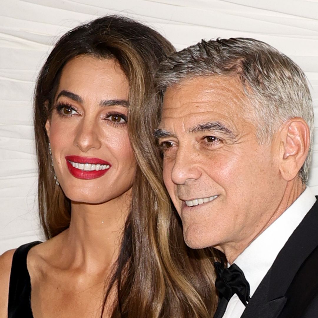 Amal Clooney is a knockout in thigh-high boots on a loved-up date with George